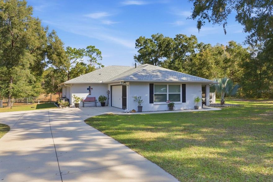 Welcome to 3727 N Boxelder Way, a well-cared-for 3-bedroom, 2-bath home built in 2015 that offers comfort, privacy, and thoughtful upgrades throughout. Arrive at a screened front porch, perfect for relaxing before stepping into the home. Inside, a wide foyer with a large coat closet sets the tone for the spacious layout ahead. The home features a neutral color scheme, tile flooring throughout, and recessed lighting that keeps the main areas feeling bright and modern. The living room is warm and inviting, highlighted by a skylight that brings in soft natural light. A formal dining area sits just off the main hallway, conveniently positioned between the kitchen and living room. The kitchen is designed for both everyday use and hosting, offering granite counters, custom cabinets, a gas cooktop, double built-in ovens, and a breakfast bar for quick meals. A dry bar sits just outside the kitchen—ideal for a coffee station or evening beverages. Nearby is the spacious laundry room featuring a wash sink, along with an impressive walk-in pantry for all your storage needs. The private primary suite sits on its own wing and features an oversized bedroom with French doors opening to the screened pool. The suite includes dual walk-in closets and a spa-like bathroom with a jetted tub and a rain shower. Two additional bedrooms are located on the opposite side of the home, along with an updated bathroom featuring stylish tile and a generous linen closet. Step outside to your private backyard getaway. Enjoy the screened saline pool with NEW pool pump and NEW salt cell (December 2025), shaded covered seating area, and a fully fenced, cleared yard with no neighbors to the right or behind. A 10x12 storage shed offers extra room for yard tools and equipment. The side-entry 2-car garage adds convenience and curb appeal. Located in Pine Ridge Estates, one of Citrus County’s most desirable communities, this home is surrounded by miles of equestrian trails, rolling acreage, and a peaceful country setting with the convenience of nearby amenities. Residents enjoy access to an equestrian center, pickleball courts, tennis courts, a dog park, a community center, and a quiet lifestyle just a short drive from some of Florida’s most beautiful natural attractions—including Rainbow River State Park, Homosassa Springs State Park, and Crystal River, famous for its clear waters and manatees. Don’t miss your chance to experience this beautiful property—schedule your appointment today!