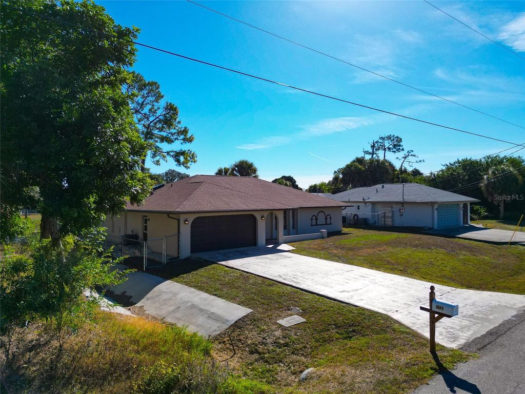 Photo of 2176 Barksdale Street, Port Charlotte, FL 33948 (MLS # A4672149)