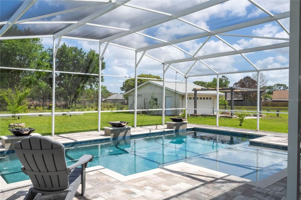 Photo of 8595 Millinockett Lane, Orlando, FL 32825 (MLS # O6398925)