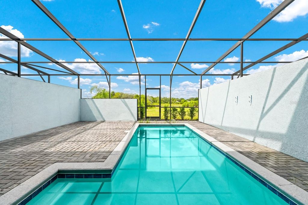 Photo of 7513 Oak Spring Lane, Davenport, FL 33837 (MLS # O6392248)