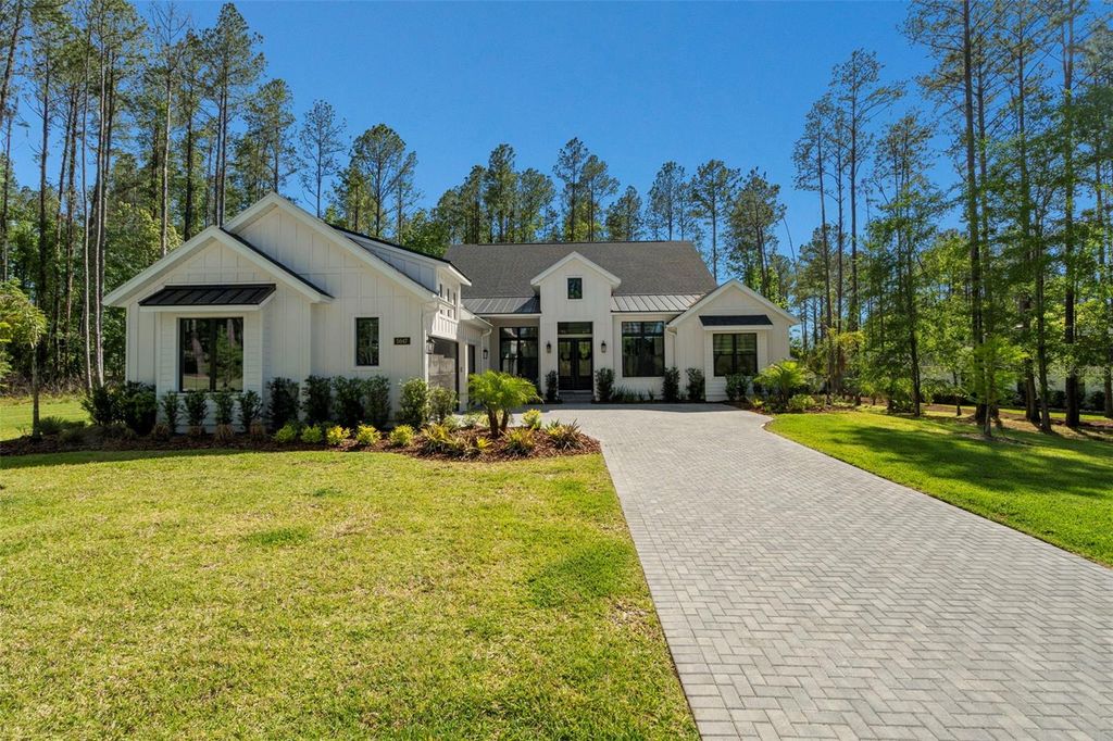 Photo of 5047 Summit View Drive, Brooksville, FL 34601 (MLS # TB8498720)