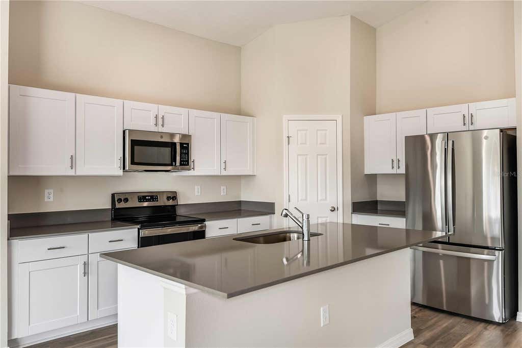 Photo of 1362 Palmeroy Road, Haines City, FL 33844 (MLS # TB8525669)