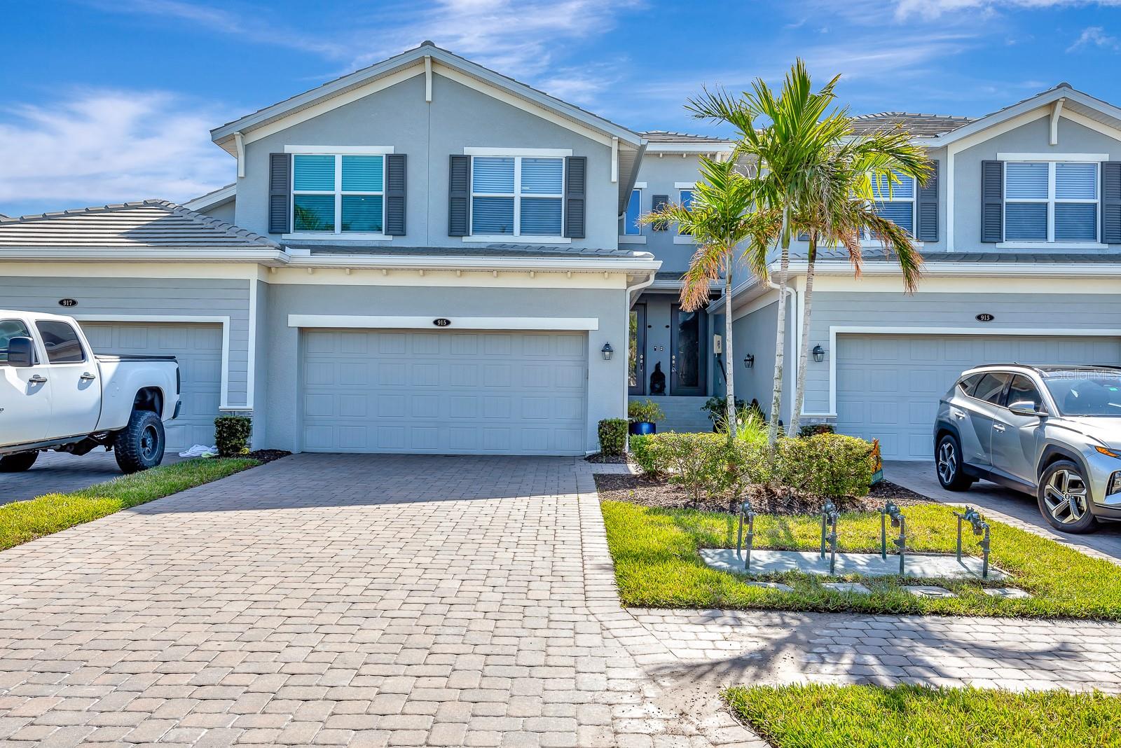Impeccable 3 bedroom, 2 bathroom 2110 ft² home with a two car garage and screened in lanai. Contemporary open split plan with large living room and open kitchen, teeming with natural light & water views. Primary suite has two walk-in closets, a large en-suite bathroom with his and hers sinks and an oversized walk-in shower. All bathrooms and kitchen have quartz countertops and solid wood, soft-close cabinetry. The kitchen has stainless appliances, a reverse osmosis water filtration system. Enjoy resort style amenities: 3 pools, 2 gyms, 3 tennis courts, a clubhouse with activities director, a marina, dog park, playground, riverfront walking path, kayak launch. For boaters, marina slips are available for rent, with boat lift access to the Manatee River, which quickly gets you to the Gulf.