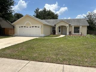 This is your chance to own this updated 3-bedroom 2-bathroom home in the beautiful Eastbrook neighborhood. This quiet well-maintained subdivision is just minutes from both I-4 and DeLand’s beautiful downtown. The 1214 square foot home has been completely repainted both inside and out, features an open concept and split bedrooms. As you enter this home you will immediately notice the new wood look ceramic tile throughout. The great room features high ceilings, sliding glass doors and space for both living and dining. In cooler weather, open the doors to the patio and enjoy indoor and outdoor living. The kitchen has new stainless-steel appliances and is large enough for a breakfast nook. With a large pass through between the kitchen and great room even the cook is a part of the conversation. The primary bedroom is spacious, with high ceilings and sliding doors to the patio. The ensuite has been completely updated with a new vanity, toilet, and tiled walk-in shower. The other two bedrooms are large and share a newly renovated bathroom. This bathroom also has a new vanity, toilet and a
tiled tub and shower combo. The two-car garage provides space for both vehicles and storage. It also includes a refrigerator, space for a washer and dryer, and the natural gas hot water heater. While the new appliances are electric, the house is piped for natural gas both in the kitchen and the garage. Make an appointment to see all this house has to offer!