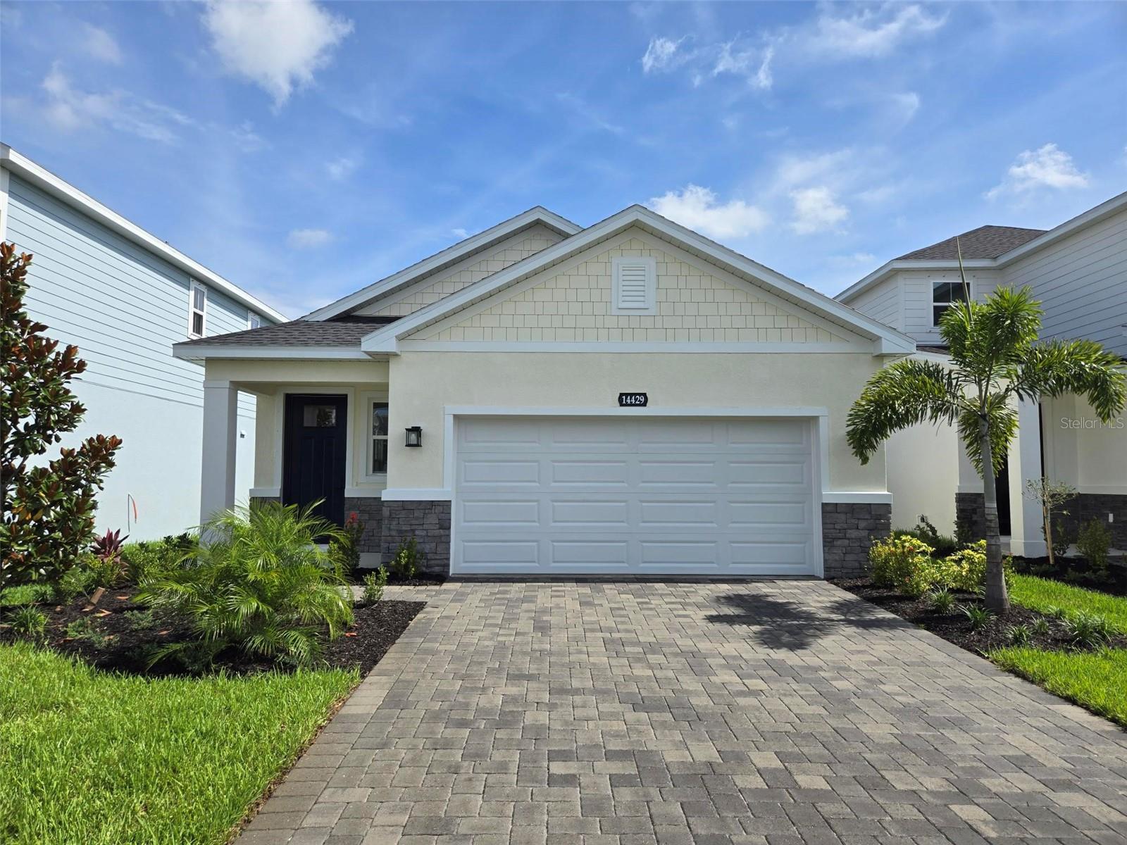 Welcome to Avalon Woods at Lakewood Ranch, single-family homes with no CDD and low fees. Your new home will be just minutes from endless options for shopping, dining, entertainment, schools, healthcare, nature, and recreation. Top-rated Manatee County schools. Parks and recreation programs including fitness, youth sports, arts and entertainment. There’s so much to do here! The Acadia centers around a bright, airy open-concept design where the kitchen, dining, and great room connect seamlessly to create a cohesive living environment. Strategic window placement maximizes natural light throughout, enhancing the sense of spaciousness and creating an inviting atmosphere for daily life. The owner’s suite, featuring an included tray ceiling is located at the rear of the home ensuring maximum privacy. The owner’s bath provides a spa-like retreat, featuring a double vanity, compartmentalized water closet, built-in shower seat, and convenient linen closet. Windows positioned at the shower introduce natural light while maintaining privacy, creating a bright, refreshing atmosphere. All Ryan Homes now include WIFI-enabled garage opener and Ecobee thermostat. **Closing cost assistance is available with use of Builder’s affiliated lender**. DISCLAIMER: Prices, financing, promotion, and offers subject to change without notice. Offer valid on new sales only. See Community Sales and Marketing Representative for details. Promotions cannot be combined with any other offer. All uploaded photos are stock photos of this floor plan. Actual home may differ from photos.