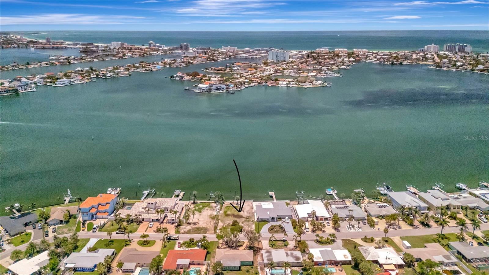 Welcome to Pasadena Isle — one of South Pasadena’s most desirable waterfront communities! Now is your chance of a lifetime to build your custom coastal retreat. Enjoy the gorgeous open water views and sunsets over St. Pete Beach! Properties on each side of this lot are also on the market, creating endless opportunities for your new dream home. Set on a quiet street, this spacious lot provides ample room for a luxurious single-family home with a pool, outdoor living spaces, and even a private dock (subject to permitting). Located just minutes from award-winning beaches, several shops and restaurants. Take a short drive to the vibrant downtown St. Petersburg for more shopping and dining options. Boaters will love the quick access to open waters with easy access to the Gulf of Mexico. Enjoy the best of Florida living — breathtaking sunsets, gentle sea breezes, and the convenience of nearby shopping, dining, marinas, and healthcare facilities. Don’t miss this incredible chance to create your personal paradise on the highly sought after Pasadena Isle. Schedule your showing today and start planning your dream home!