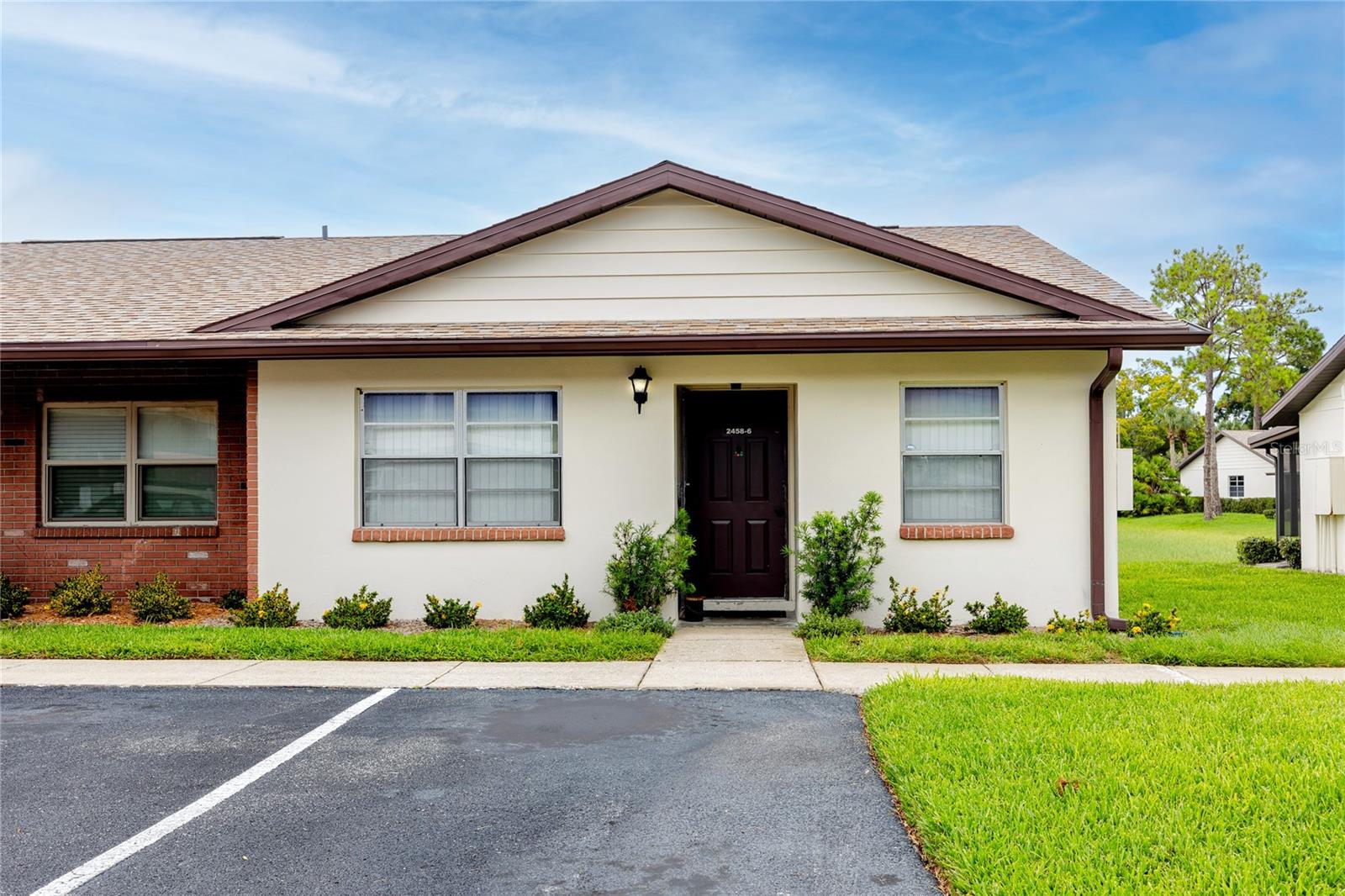Tucked inside the quiet Villas at Countryside community, this 2-bed, 2-bath villa-style condo combines practical upgrades with an unbeatable location. The single-story layout features tile flooring throughout, spacious bedrooms, and an in-unit washer and dryer for everyday convenience. Step outside to your private patio or enjoy the community’s heated pool and shuffleboard court just steps away. With a long-term tenant in place through September, the property offers immediate income potential or a smooth path to personal use. Located in a high-and-dry, non-flood zone just minutes from Countryside Mall, you'll enjoy easy access to shopping, dining, parks, and more. Don’t miss this rare chance to own in one of Pinellas County’s most desirable, low-maintenance communities. Call or text today to schedule your private showing.