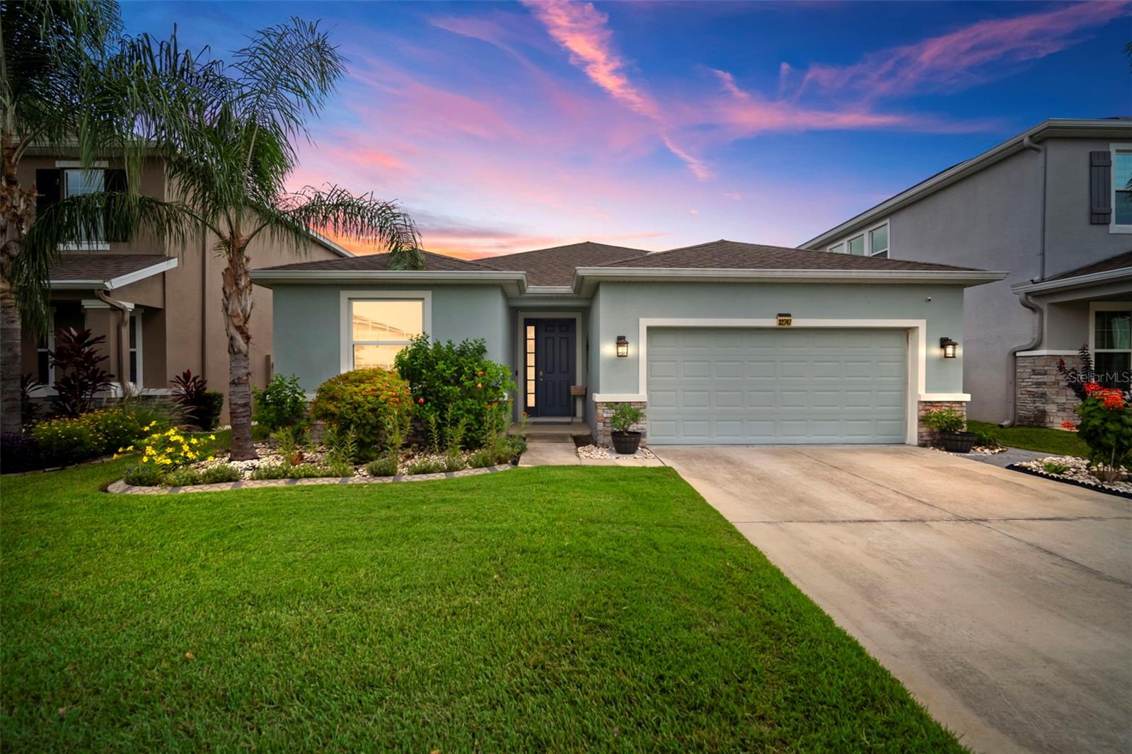 One or more photo(s) has been virtually staged. Live where comfort meets connection in this better-than-new 4 bedroom, 2.5 bath home in Wesley Chapel’s sought-after Union Park. Designed for how you live today and how you want to live tomorrow this thoughtfully upgraded one-story home blends everyday ease with elevated living.
Step into a kitchen made to be lived in and loved featuring a propane gas cooktop, electric oven, second wall oven, extra-tall cabinetry, and stainless appliances that make cooking feel effortless. The open-concept layout flows into a sun drenched -season glass sunroom, perfect as a second living space, playroom, creative studio, or work-from home haven complete with insulated roof, UVA shades, and ceramic flooring.
Just beyond, enjoy evening meals or morning coffee on your panoramic screened lanai, framed by wrought iron fencing and a decorative patio a private backyard retreat designed for relaxation or gatherings. Additional details like custom window shades, ceiling fans, and a dedicated walkway to the trash slab show how every inch was curated with intention.
High speed gigabit internet is included, making this an ideal setup for remote professionals. Zoned for A-rated schools, and just a short walk to the neighborhood’s charter academy, this home offers access to resort style amenities: 2 pools, splash pad, parks, dog park, fitness trails, and more all with a low HOA and no flood zone.
This isn’t just a home it’s a lifestyle. Move-in ready, meticulously maintained, and fully upgraded all that’s missing is you.