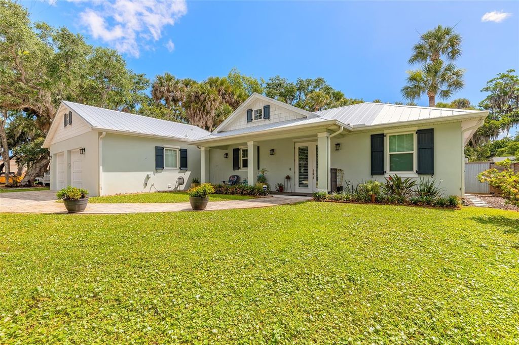 Photo of 1107 S Orange Street, New Smyrna Beach, FL 32168 (MLS # NS1088193)