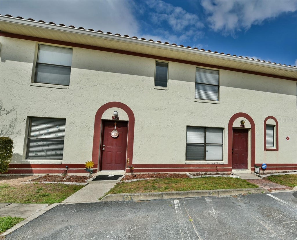 Photo of 1621 Sandy Point Square #61, Orlando, FL 32807 (MLS # O6439884)
