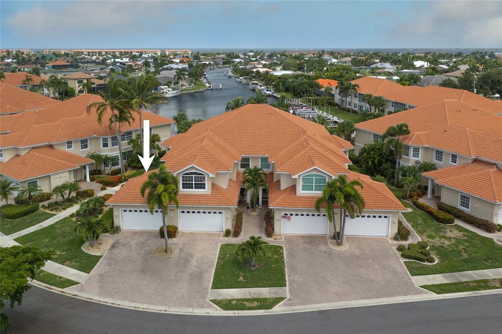 Photo of 2590 Tarpon Cove Drive #821, Punta Gorda, FL 33950 (MLS # C7528599)