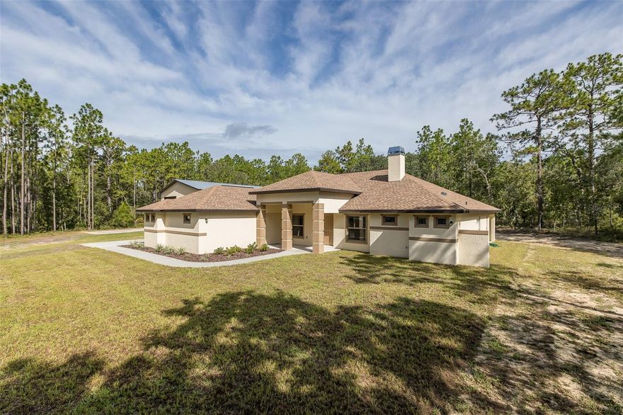 MOTIVATED SELLER! BRING OFFERS! BRAND NEW HOME...This 2025 country-style home on 9.6 private wooded acres in sought-after Country Haven Estates!  Nestled in the peaceful enclave of Country Haven Estates, this 9.6-acre wooded estate offers privacy, serenity, and the perfect setting for your dream home. Envision a charming country-style cottage with vaulted ceilings, wood-plank tile floors, and an open-concept living space centered around a cozy fireplace and a wall of sliding glass doors opening to a covered porch with tranquil forest views.

The kitchen features granite counters, a breakfast bar, nook, and pantry. A split layout provides a luxurious primary suite with tray ceiling, uplighting, dual walk-in closets, and spa-like bath. Two guest bedrooms, a versatile den, and even a HIDDEN BUNKER ADDS A UNIQUE APPEAL. A spacious laundry room with sink, IMPRESSIVE OVERSIZED THREE DOOR GARAGE GEARED AS THE ULTIMATE MANCAVE FOR ALL YOUR HOBBIES WHICH IS IS EQUIPED WITH ELECTRICITY AND PLUMBED FOR WATER.  The fully fenced grounds make it both practical and inviting.

Located just minutes from Weeki Wachee Springs, the Suncoast Trail, and Pine Island Beach, with easy access to the Suncoast Parkway for a quick commute to Tampa Bay, this property offers the perfect blend of rural charm and convenience. Deed restrictions ensure quality, and a survey is included.