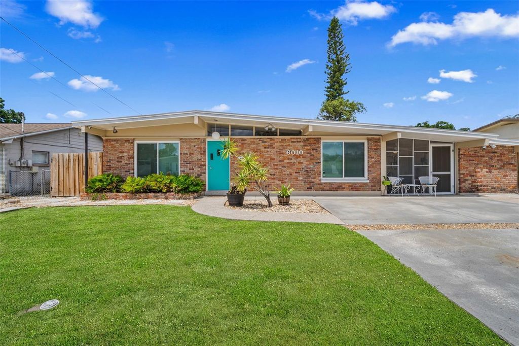 Photo of 6010 N Gunlock Avenue, Tampa, FL 33614 (MLS # TB8512236)