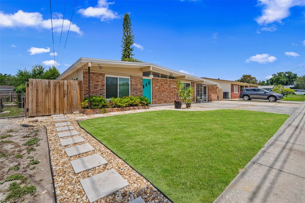 Photo of 6010 N Gunlock Avenue, Tampa, FL 33614 (MLS # TB8512236)