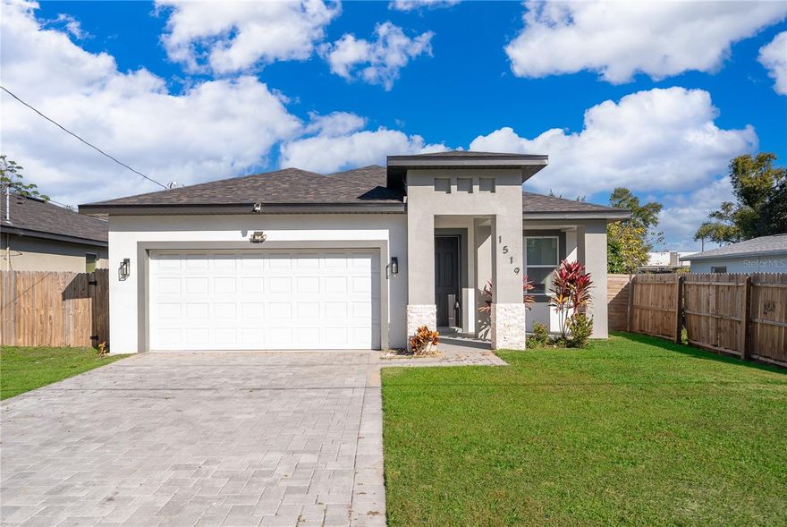 Welcome to this beautifully upgraded 2023-built single-family home offering 4 bedrooms and 2.5 bathrooms with NO HOA, located in a rapidly growing area of Orlando. This move-in-ready home features laminate flooring throughout, an open and modern layout, and upgraded finishes thoughtfully designed throughout the home.

The kitchen is equipped with stainless steel appliances and ample cabinet space, making it ideal for both everyday living and entertaining. Enjoy outdoor living with a fully fenced backyard, perfect for privacy, pets, or gatherings. The paver driveway enhances curb appeal and durability.

The finished garage includes painted floors and walls along with a convenient utility wash sink, providing added functionality. Located just minutes from Downtown Orlando with quick access to I-4 and SR-408, this home is close to Camping World Stadium, the Kia Center, shopping, dining, parks, and major employment centers. Ongoing development in the area adds to the long-term value of this property.