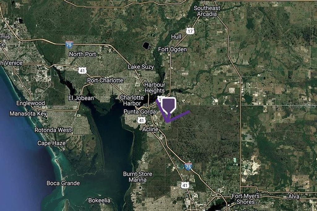 Photo of 29120 Polk Drive, Punta Gorda, FL 33982 (MLS # D6147578)