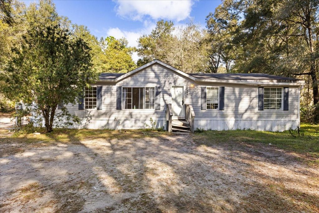 Photo of 10385 SW 152nd Place, Dunnellon, FL 34432 (MLS # O6370485)