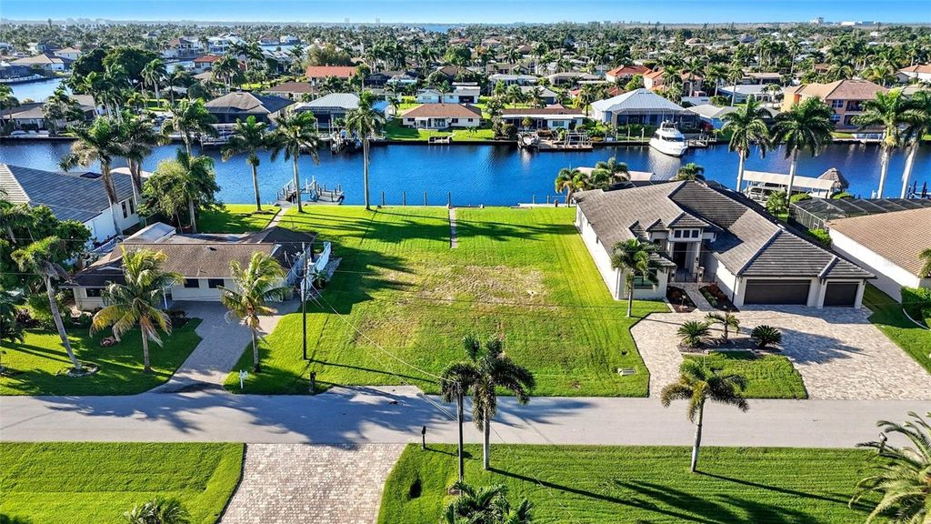 Photo of 126 SW 50th Street, Cape Coral, FL 33914 (MLS # TB8436655)