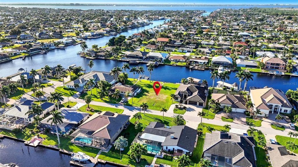 Photo of 126 SW 50th Street, Cape Coral, FL 33914 (MLS # TB8436655)