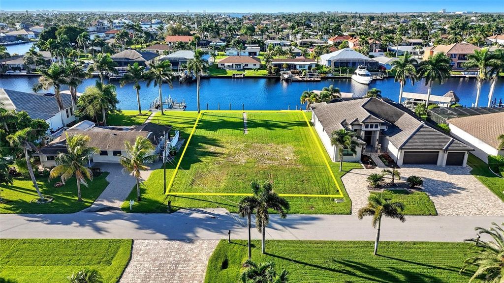 Photo of 126 SW 50th Street, Cape Coral, FL 33914 (MLS # TB8436655)