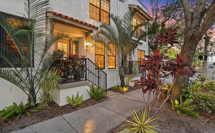 Experience the charm of Mediterranean-inspired living in this beautifully crafted townhouse located in the vibrant heart of downtown St. Petersburg. This thoughtfully designed residence stands out with its rare private rooftop terrace, ideal for enjoying Florida’s year-round sunshine, evening gatherings, or taking in downtown views. With low HOA fees (only $100/month) and a layout that balances comfort with sophistication, this home offers exceptional value in one of St. Pete’s most sought-after neighborhoods. Recent upgrades, including a new roof and a newer AC system, provide added peace of mind and long-term efficiency.

The spacious first floor welcomes you with an open-concept living and dining area, perfect for entertaining or quiet relaxation. A conveniently placed half bath serves guests, while the chef’s kitchen impresses with stone countertops, solid hardwood cabinetry, high-end stainless steel appliances, and ample prep and storage space ideal for cooking enthusiasts and everyday convenience.

Upstairs, the second level features two generous bedroom suites, each with its own private bathroom. This dual-suite configuration provides flexibility for roommates, guests, or a dedicated office or dressing suite. Both bedrooms offer excellent natural light and well-designed layouts that maximize privacy.

The third-floor rooftop terrace elevates the living experience—use it as an outdoor lounge, garden space, grilling area, or peaceful retreat under the stars. Few downtown properties offer this type of exclusive outdoor living, making it a standout feature for those who value both space and lifestyle.

Additional enhancements include energy-efficient lighting and deeded parking, all contributing to a secure, comfortable, and low-maintenance living environment.

Located in a prime downtown corridor, this home places you minutes from acclaimed restaurants, boutique shopping, waterfront parks, museums, and major thoroughfares—offering the perfect blend of walkability, convenience, and modern urban living.