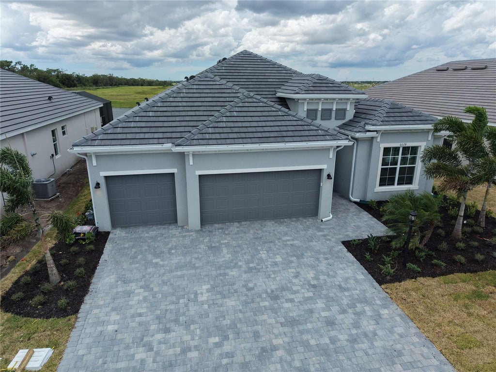 Photo of 6028 Mound Key Run, Lakewood Ranch, FL 34211 (MLS # A4706886)