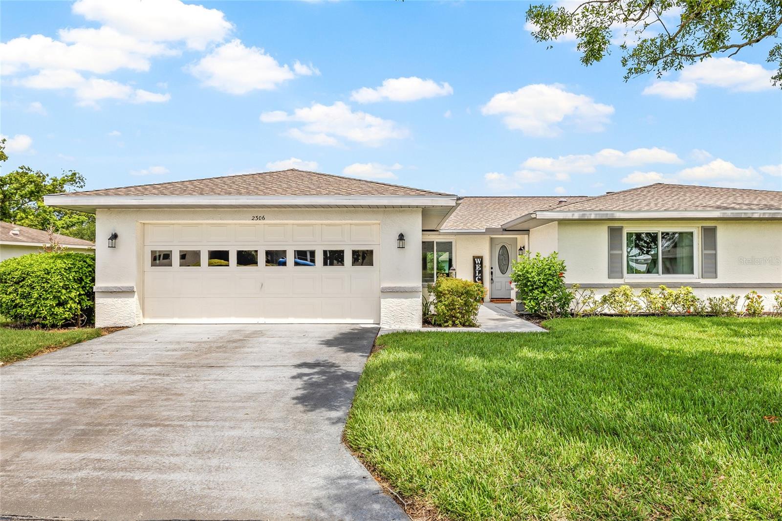 ** NEW PRICE ** Seller Motivated. Welcome to the exclusive Golf Club community of Kings Point! This is the perfect opportunity to own a beautifully maintained home that offers it's owners the chance to enjoy the comforts of vacation style living, all year round. This home is move-in ready and new owners should feel confident with its NEW ROOF (May 2025) and Newer AC Unit (installed 2 years prior). Windows have been upgraded to hurricane impact resistant double pane energy efficient windows. The expanded Florida Room has been updated to include in the total heated square footage of the home (1642 sqft). Enjoy the natural light offered by the large windows throughout, as well as the Solar Tubes in both the breakfast area as well as the two bathrooms. This Active Community offers its residents the best amenities, resembling only those found in a Florida Resort. Enjoy the 20/20 Fitness/Spa Building, Outdoor Pools, Spas, Veteran's Theater, Lawn Bowling, Pickle Ball and Tennis courts, not to mention the wood working shop, stained glass studio, pottery, card clubs, multiple dining options, and much, much, more! Feel safe and secure in this gated community with its staff on hand to ensure your privacy is protected and your fun time is not interrupted. King's Point is fully accessible in golf cart and there are no time restrictions. Welcome to the Best 55+ community in Sun City !