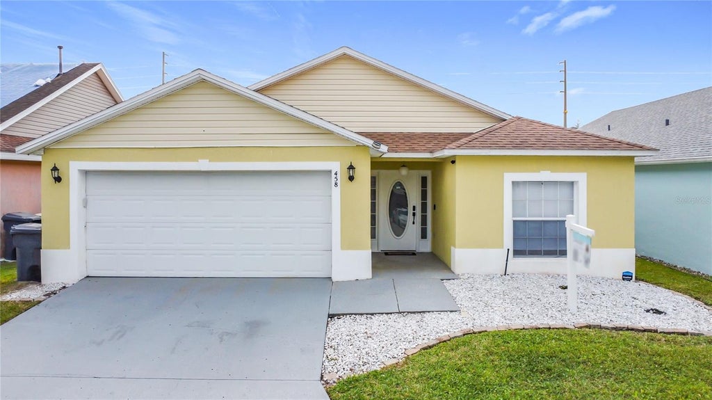 Photo of 458 Hollinghead Loop, Davenport, FL 33896 (MLS # O6416303)