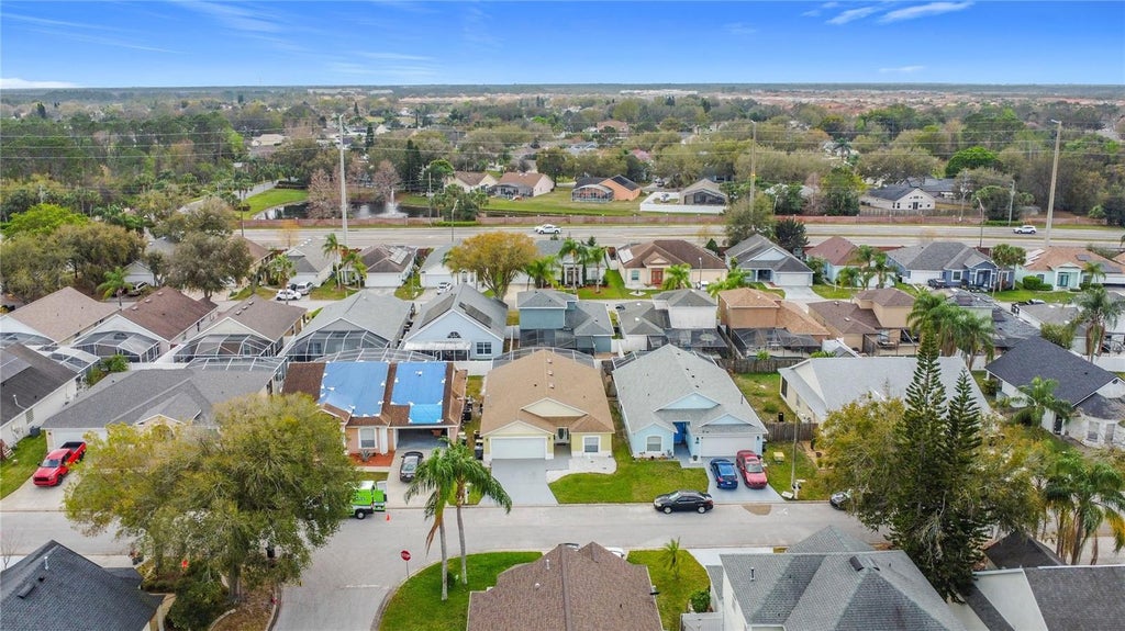 Photo of 458 Hollinghead Loop, Davenport, FL 33896 (MLS # O6416303)