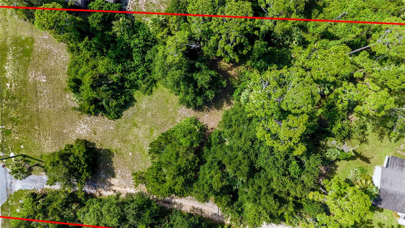 UNIQUE Property ALERT: SO MUCH POTENTIAL!!! Over 1 ACRE of land in the heart of Flagler Beach. ENDLESS POSSIBILITIES: BUILD up to TWO additional homes-DEVELOP your OWN private COASTAL estate. ETC. Great OPPORTUNITY for INVESTORS, builders, and/or MULTI-GENERATIONAL living.
Property UPGRADES and FEATURES:
This UPGRADED 4-bedroom, 2.5-bath HOME with a 2-car GARAGE sits on the rear parcel and OFFERS a host of MODERN IMPROVEMENTS for COMFORTABLE LIVING:
* Roof replaced in 2017
* New HVAC system INSTALLED in 2021
* Septic system with a NEW leach field REPLACED in 2021
* FRESHLY painted interior
* 2024 Brand new carpet throughout
* Newer water heater for added efficiency
* 100 lb. LEASED propane tank
* Spacious rear screened porch – PERFECT for outdoor relaxation
*** Zoned Flood Zone X – HIGH and DRY with NO flood INSURANCE requirements
This move-in ready home COMBINES peace of mind with PRACTICAL updates—ideal for FAMILIES or INVESTORS seeking low-maintenance living. Less than HALF OF A MILE to the BEACH. PRIVATE setting with easy ACCESS to local shops, dining, and entertainment and of course- THE OCEAN!
LOCATED in one of FLORIDA'S most beloved COASTAL towns, FLAGLER BEACH offers the perfect mix of LAID-BACK BEACH VIBES and vibrant COMMUNITY LIFESTYLE. With over eight miles of CINNAMON SAND BEACH, along with surfing, biking, walking trails, FISHING, and a bustling downtown filled with eclectic restaurants, bars, and boutiques, this is MORE than a property—it’s a LIFESTYLE. OVER 1 ACRE IN THE HEART OF FLAGLER BEACH?? IMAGINE THE POSSIBILITIES....