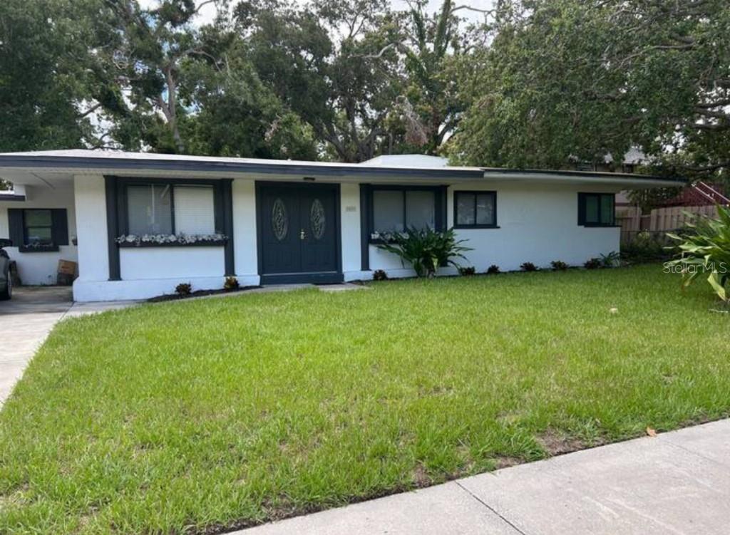 Located in the heart of Sarasota, this beautifully updated mid-century home offers 3 bedrooms, 2 bathrooms, and timeless curb appeal. Nestled on a tree-lined street just minutes from downtown, The Bay Park, and Gulf Coast beaches, this residence combines classic charm with modern upgrades.
The home features a crisp white exterior with dark trim accents, inviting double-door entry, and large windows that flood the interior with natural light. The spacious layout includes an open living and dining area, an updated kitchen, and two fully renovated bathrooms. Each bedroom offers ample closet space and comfortable proportions, making this home perfect for families, seasonal residents, or investors.
Set on a generously sized lot with mature landscaping, there’s plenty of room to enjoy outdoor living or even add a pool. No HOA or deed restrictions, offering flexibility for short-term rentals or personalization.
Don’t miss the opportunity to own a move-in ready home in one of Sarasota’s most convenient and desirable neighborhoods.