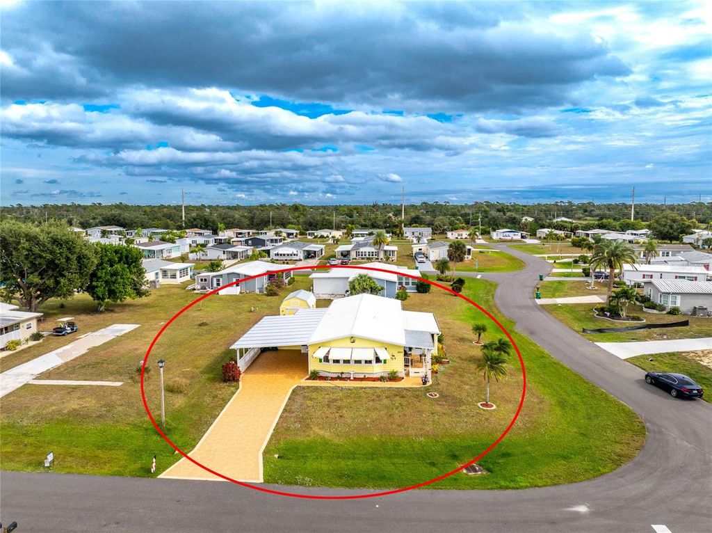 Photo of 6290 Greenfinch Road, Englewood, FL 34224 (MLS # D6143605)