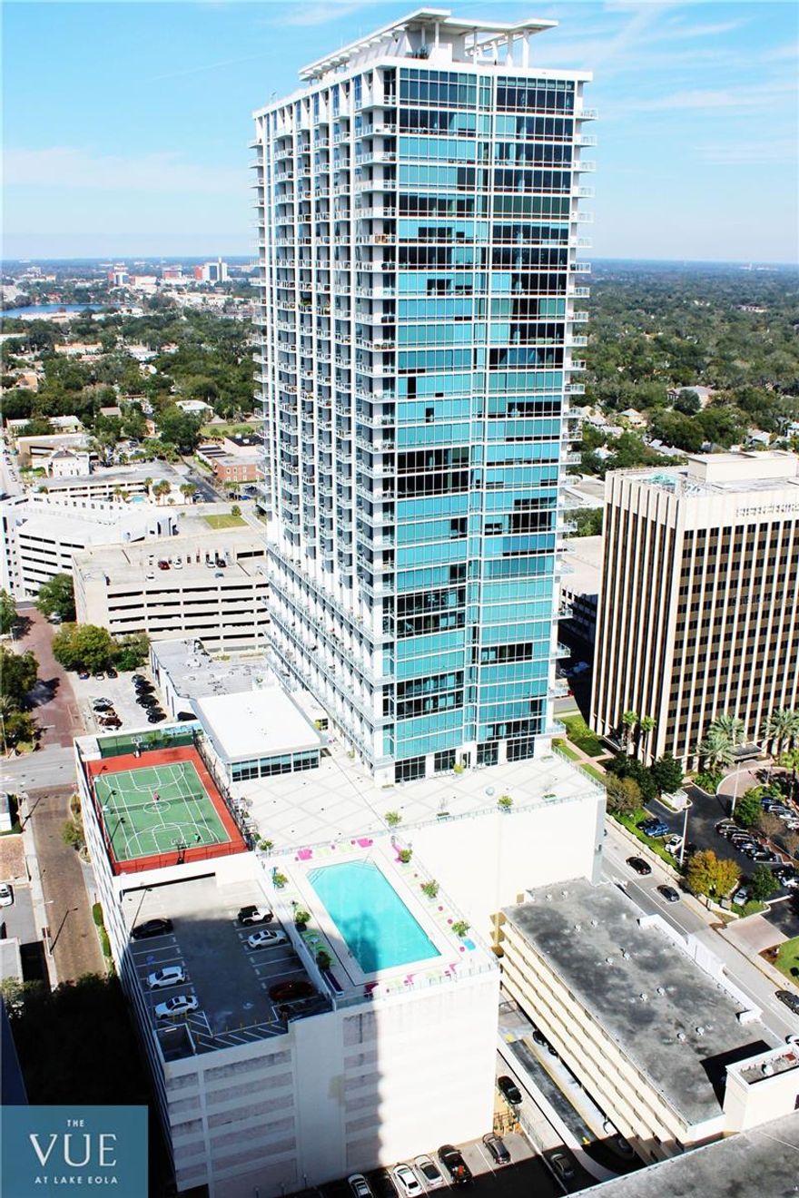 One or more photo(s) has been virtually staged. The Vue at Lake Eola is a prominent residential skyscraper in Downtown Orlando, offering residents a high-rise urban living experience with spectacular views and a range of amenities. Here are some key features and highlights of The Vue at Lake Eola:

Tallest Building in Downtown: The Vue is the third tallest building in Downtown Orlando, with 34 floors of condos and penthouses. It stands only two feet shorter than The Peabody Orlando and 15 feet shorter than the Truist Center.
Penthouses with Balcony Access: The penthouses on the top level of The Vue provide residents with access to a balcony on the 36th floor roof of the building. This feature offers breathtaking views of the city.
Urban Living: The name “The Vue” is fitting because residents enjoy spectacular vistas from each of the building’s 36 stories. Floor-to-ceiling windows contribute to the panoramic views of Lake Eola, the city, and its surroundings.
Luxury Amenities: The Vue offers an array of luxury amenities, including an elegant lobby, a 24-hour doorman, concierge services, an art gallery, wine vault, a cybercafé, and a conference room. These amenities cater to an upscale urban lifestyle.
Health and Recreation: Residents can take advantage of a 5,000 sq. ft. health club, a resort-style skyline pool, and tennis/basketball courts on the amenity deck. There’s also a pet park for the convenience of pet owners.
State-of-the-Art Building: The Vue is a state-of-the-art building nestled along Lake Eola, offering modern high-rise luxury living. The building is equipped with the latest amenities and technologies.
Variety of Floor Plans: The Vue offers a range of floor plans, from small studios to large 3-bedroom, 3-bath homes. These units often include luxury touches such as hardwood floors, high ceilings, and granite kitchens.
Central Location: The building is centrally located at 150 E Robinson Street, providing residents with easy access to Lake Eola, the Farmers Market, Amway Center, restaurants, bars, and entertainment options in Downtown Orlando.
Floor-to-Ceiling Glass: The living areas in The Vue feature floor-to-ceiling glass, allowing residents to make the most of the stunning views. This is a distinctive feature not commonly found in older condo buildings in the area.
Heart of Downtown: Living at The Vue puts residents in the heart of downtown Orlando, where they can enjoy the vibrant urban environment, cultural events, and the convenience of walking to various attractions and amenities.
The Vue at Lake Eola offers a luxurious and modern high-rise living experience in Downtown Orlando, boasting breathtaking views, upscale amenities, and a prime location for residents to enjoy the best that the city has to offer.