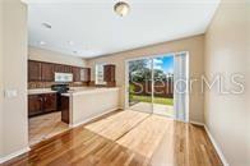 Photo of 9434 Silver Buttonwood Street, Orlando, FL 32832 (MLS # O6409255)