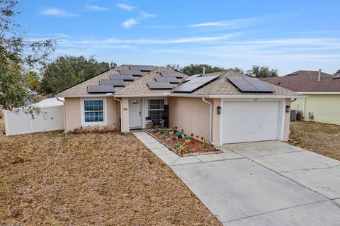 Photo of 124 Walpole Loop, Davenport, FL 33897 (MLS # O6386497)