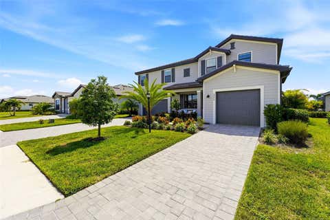 Photo of 4886 Seafoam Trail, Bradenton, FL 34211 (MLS # A4703925)