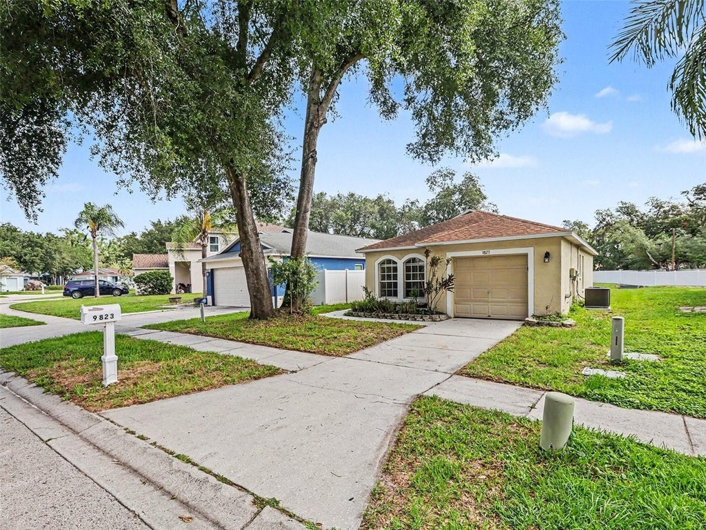 Photo of 9823 Morris Glen Way, Tampa, FL 33637 (MLS # O6412837)
