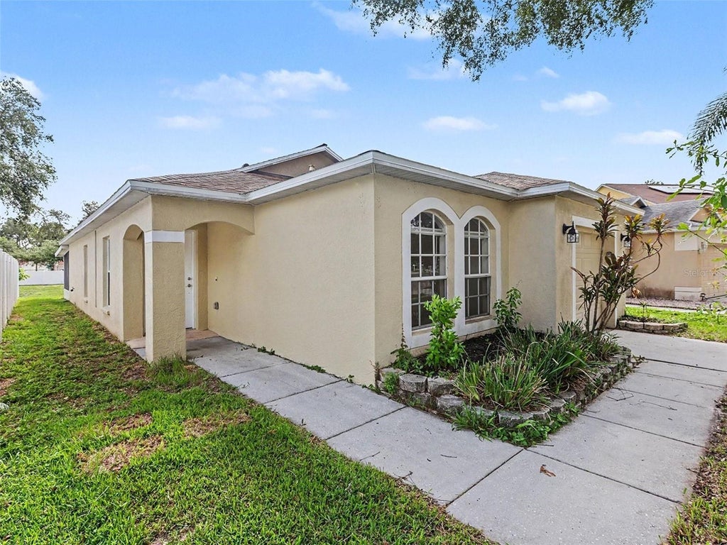Photo of 9823 Morris Glen Way, Tampa, FL 33637 (MLS # O6412837)
