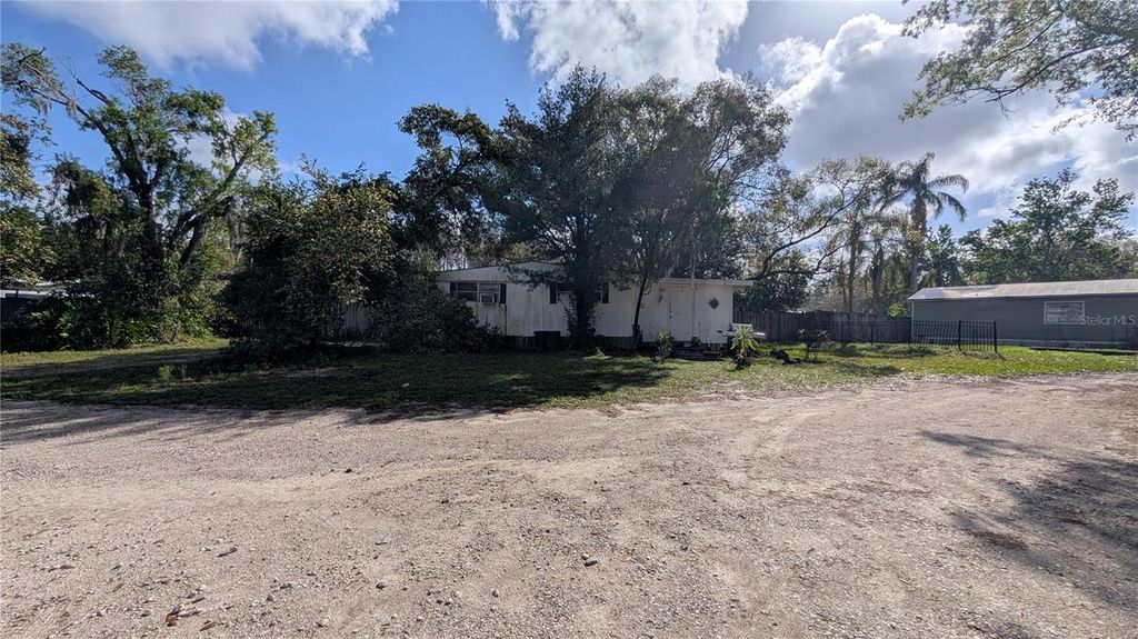 Photo of 1960 Andrews Loop, Lutz, FL 33558 (MLS # TB8483614)