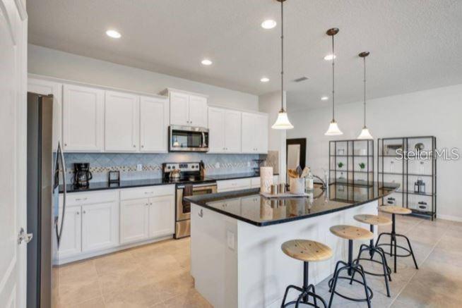 Photo of 8818 Geneve Court, Kissimmee, FL 34747 (MLS # O6434682)