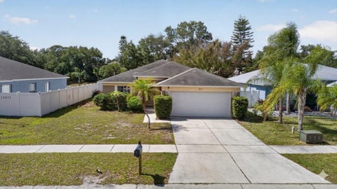 Photo of 12015 Cedarfield Drive, Riverview, FL 33579 (MLS # TB8506764)