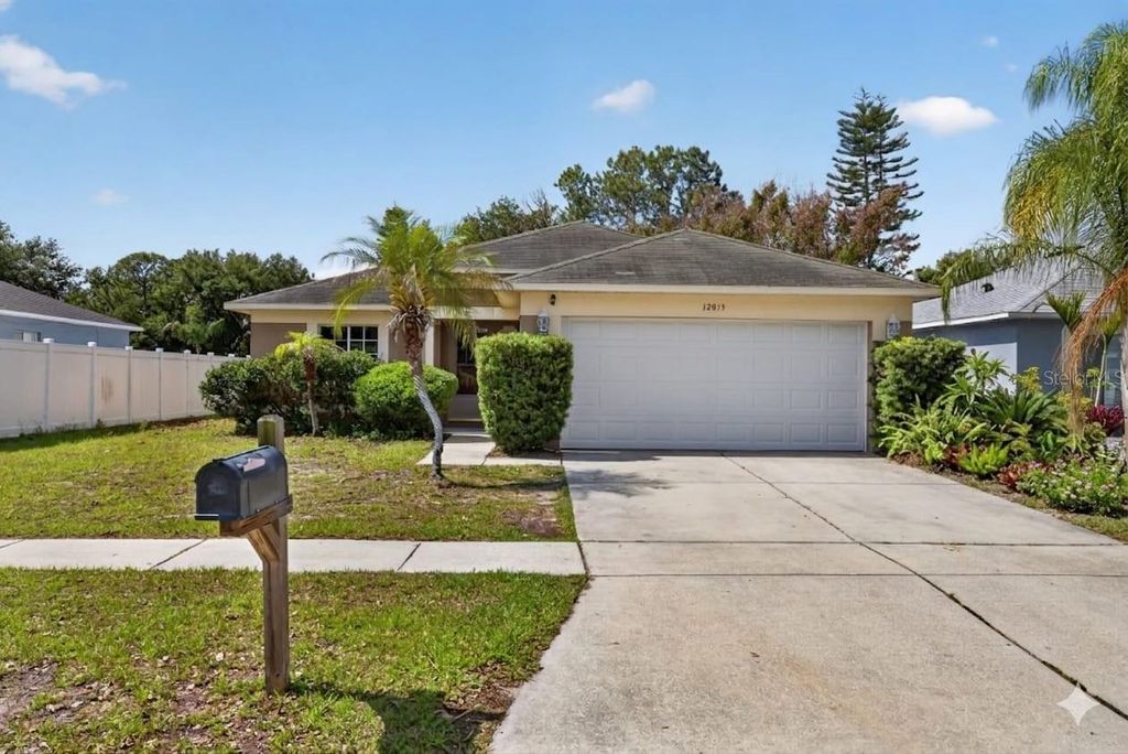 Photo of 12015 Cedarfield Drive, Riverview, FL 33579 (MLS # TB8506764)