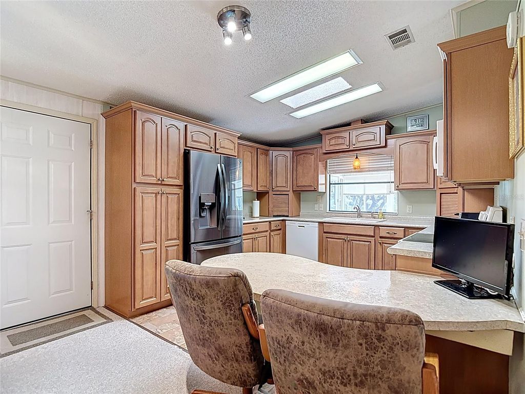 Photo of 14761 Rialto Avenue, Brooksville, FL 34613 (MLS # TB8436526)