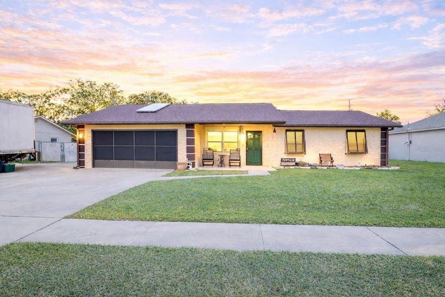 Welcome to this beautifully renovated 5-bedroom, 2-bath home in Daytona Beach, ideally located just one mile from the Intracoastal Waterway and minutes from Florida’s iconic Daytona Beach. Offering 2,275 square feet of thoughtfully designed living space, this home blends modern updates with flexibility for today’s lifestyle.

Recent upgrades include a new roof (2022), luxury vinyl plank flooring throughout, new cabinetry, quartz countertops, and stainless steel appliances, creating a fresh, move-in-ready feel. The spacious layout features two large living rooms, a dining room, and a small home office, perfect for remote work, multi-generational living, or entertaining.

Outside, enjoy a fully fenced yard with plenty of room to relax and play. The backyard is designed for outdoor living with a covered patio and built-in grilling station, ideal for weekend gatherings and coastal evenings. The property also includes a 2-car garage plus an additional parking slab behind the fence, perfect for an RV, boat, or extra vehicles.

With easy access to beaches, boating, shopping, and dining, this home delivers space, upgrades, and location—everything you need to enjoy the best of the Daytona Beach lifestyle.