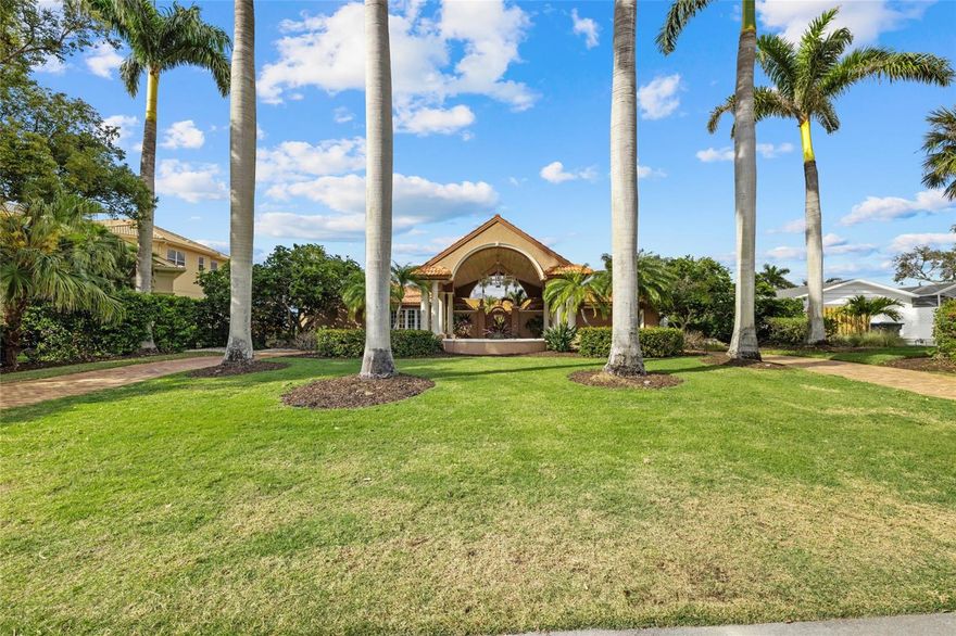 Tucked within the coveted waterfront enclave of Southpointe Shores, 1749 Sandalwood Drive is a refined expression of coastal elegance and modern sophistication in a rare private compound estate in one of Sarasota’s exclusive and premiere waterfront communities.
Perfectly positioned just moments from the world-renowned beaches of Siesta Key, this exceptional, furnished residence offers a lifestyle defined by tranquility, beauty, and effortless access to the very best of Sarasota.
Set beneath a canopy of mature palms and lush tropical landscaping, the home welcomes you with understated architectural grace and a sense of privacy that feels both exclusive and serene. The heart of the home was thoughtfully redesigned with a complete kitchen, dining, bar and living transformation featuring Lube of Italy imported custom cabinetry, Thermador appliances including a warming drawer, Brazilian granite with semi-precious stone detailing, Italian marble flooring, and curated lighting throughout. Impact glass windows and doors enhance both safety and natural light, with integrated indoor/outdoor Sonos audio, a whole-house security system with 12 cameras (2024), and dedicated electronics infrastructure provide seamless technology integration.
Expansive living and entertaining areas flow seamlessly to an impressive lanai with pool and spa, creating an ideal setting for indoor-outdoor entertaining. Whether hosting sunset gatherings, enjoying a quiet morning coffee with coastal breezes, or relaxing poolside beneath the Florida sky, the home is designed to celebrate both everyday living and special occasions. This home is two homes from the intercoastal. 
For boating enthusiasts, deep-water access provides a gateway to Sarasota Bay and beyond. A 12,000-pound boat lift and 50-amp dock service ensure both convenience and capability, supporting a true waterfront lifestyle, within minutes of open water and two houses from the intercoastal.
Southpointe Shores is treasured for its wide canals, boating culture, and established residential character. Residents enjoy proximity to premier marinas, fine dining, boutique shopping, and Sarasota’s vibrant arts and cultural scene. Siesta Key Beach, consistently ranked among the finest in the world, is just a short drive away, offering powder-soft quartz sand and breathtaking Gulf sunsets.
Major updates include a new roof (2011), room addition (2018), full re-pipe (2021), pool equipment replacement (2023), and new A/C systems (2024), reflecting the care and investment made throughout the years.
A rare opportunity to embrace refined waterfront living in one of Sarasota’s most desirable neighborhoods, where every day feels like a retreat and every evening captures the essence of coastal Florida.