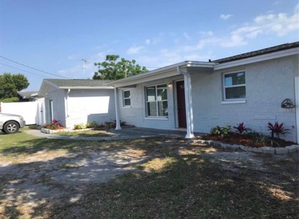 Photo of 5338 Trouble Creek Road, New Port Richey, FL 34652 (MLS # TB8493506)