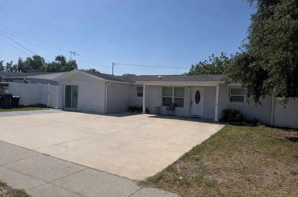 Photo of 5338 Trouble Creek Road, New Port Richey, FL 34652 (MLS # TB8493506)