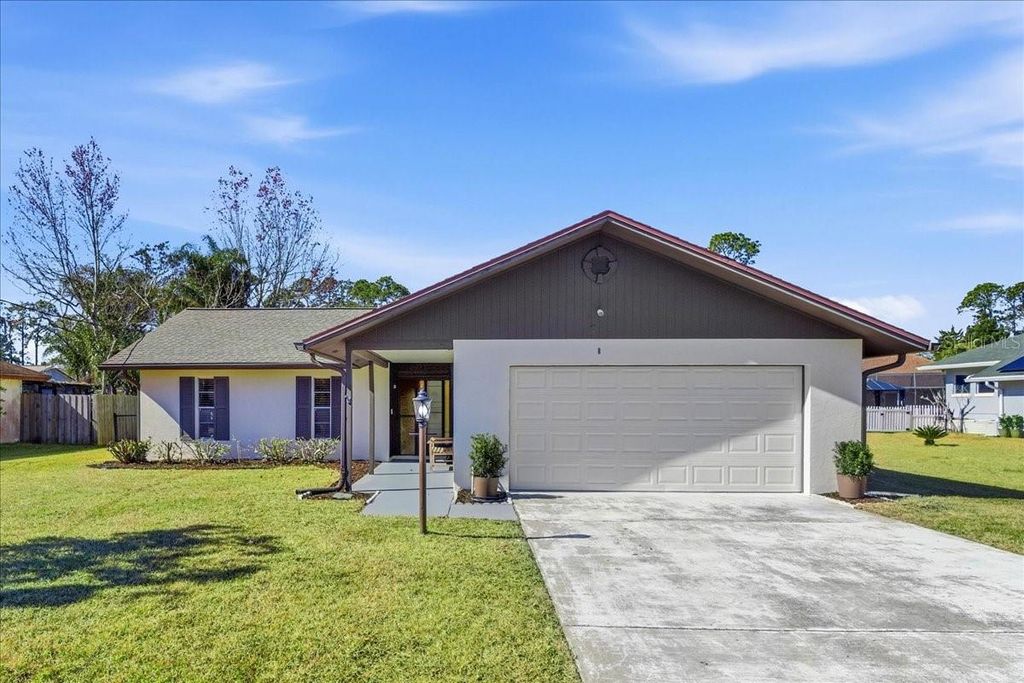 Photo of 8 Berkshire Lane, Palm Coast, FL 32137 (MLS # FC316004)