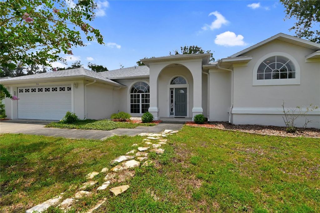 Photo of 516 Sun Lake Drive, Port Orange, FL 32127 (MLS # NS1088853)