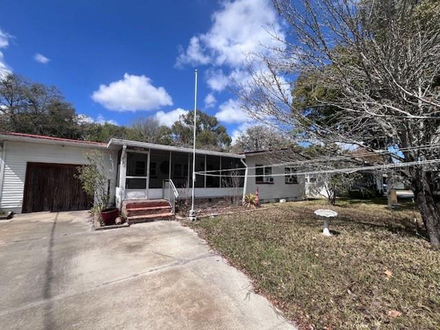 Short Sale. Fixer upper opportunity.   Concrete Block Construction with Aluminum Siding. Screened in porch. So much potential but bring your ideas and put some sweat equity into getting this back into its beautiful potential.  Shed/workship has electricity.  Irrigation provided by well pump.
All data measurements must be verified by buyer/buyer agent.